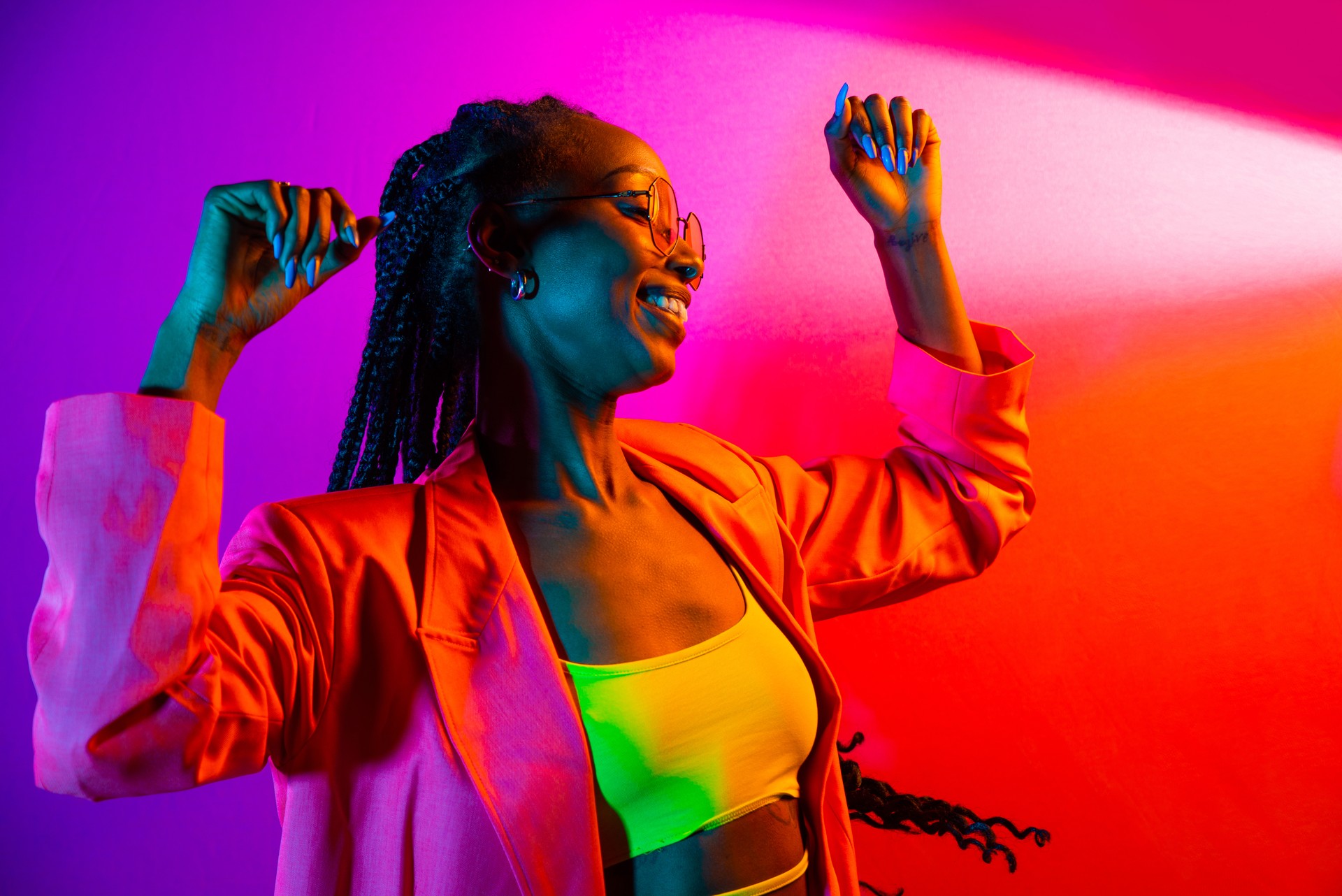 Beautiful afro woman with pigtails and stylish clothes